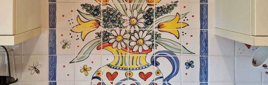 Hand painted flowers in jug tile mural