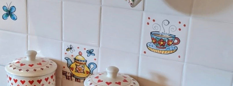 single hand painted tiles, bees, tea cups and tea pots