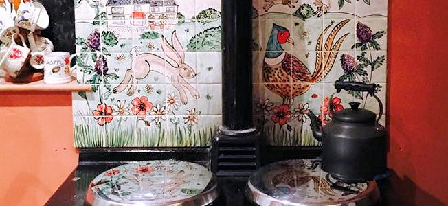 Aga kitchen splashback hand painted tile mural with hare and pheasant