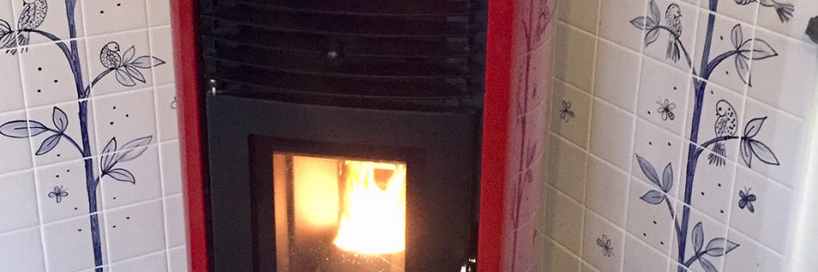 Blue and white tile mural behind stove