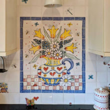 Hand painted flowers in jug tile mural