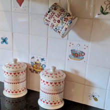 single hand painted tiles, bees, tea cups and tea pots