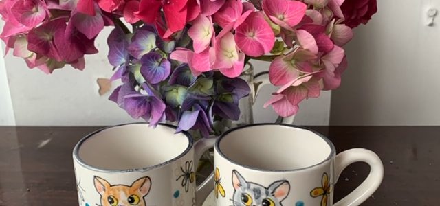 Pair of hand painted cat mugs