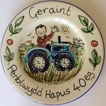 Penblwydd Hapus tractor plate