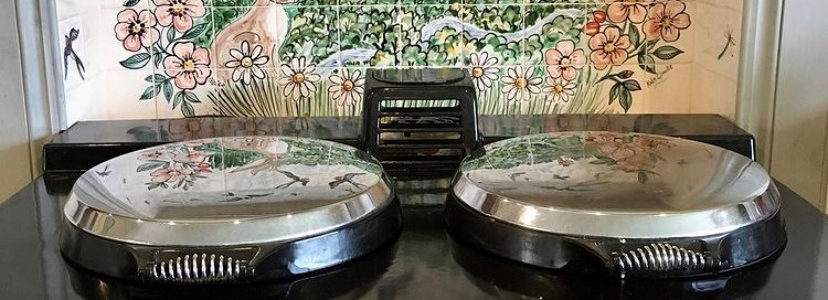 Swallows tile mural behind Aga range cooker