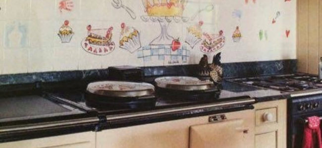 We love cakes tile mural behind Aga range cooker