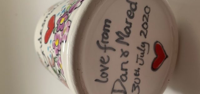 Hand painted personalised message on bottom of mug